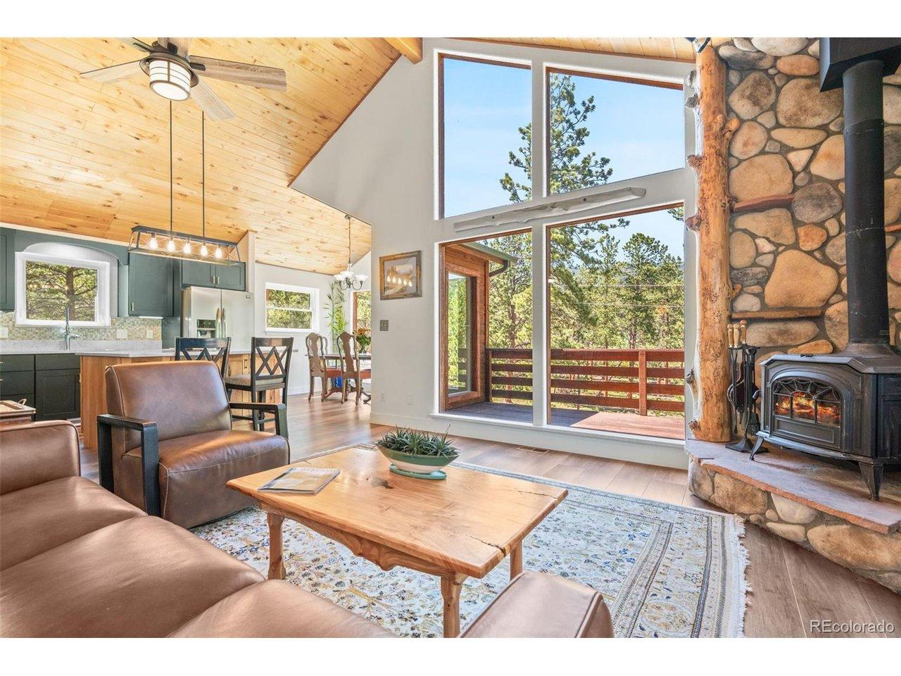 Image 2: Open-concept great room featuring the living, dining, and kitchen spaces with stunning views. Image 2: Open-concept great room featuring the living, dining, and kitchen spaces with stunning views.