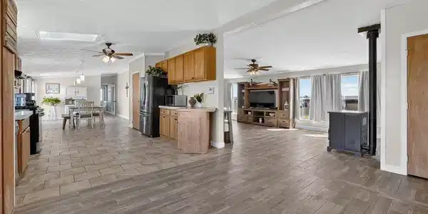 Image 4: Entering from rear/North of home to spacious living layout Image 4: Entering from rear/North of home to spacious living layout