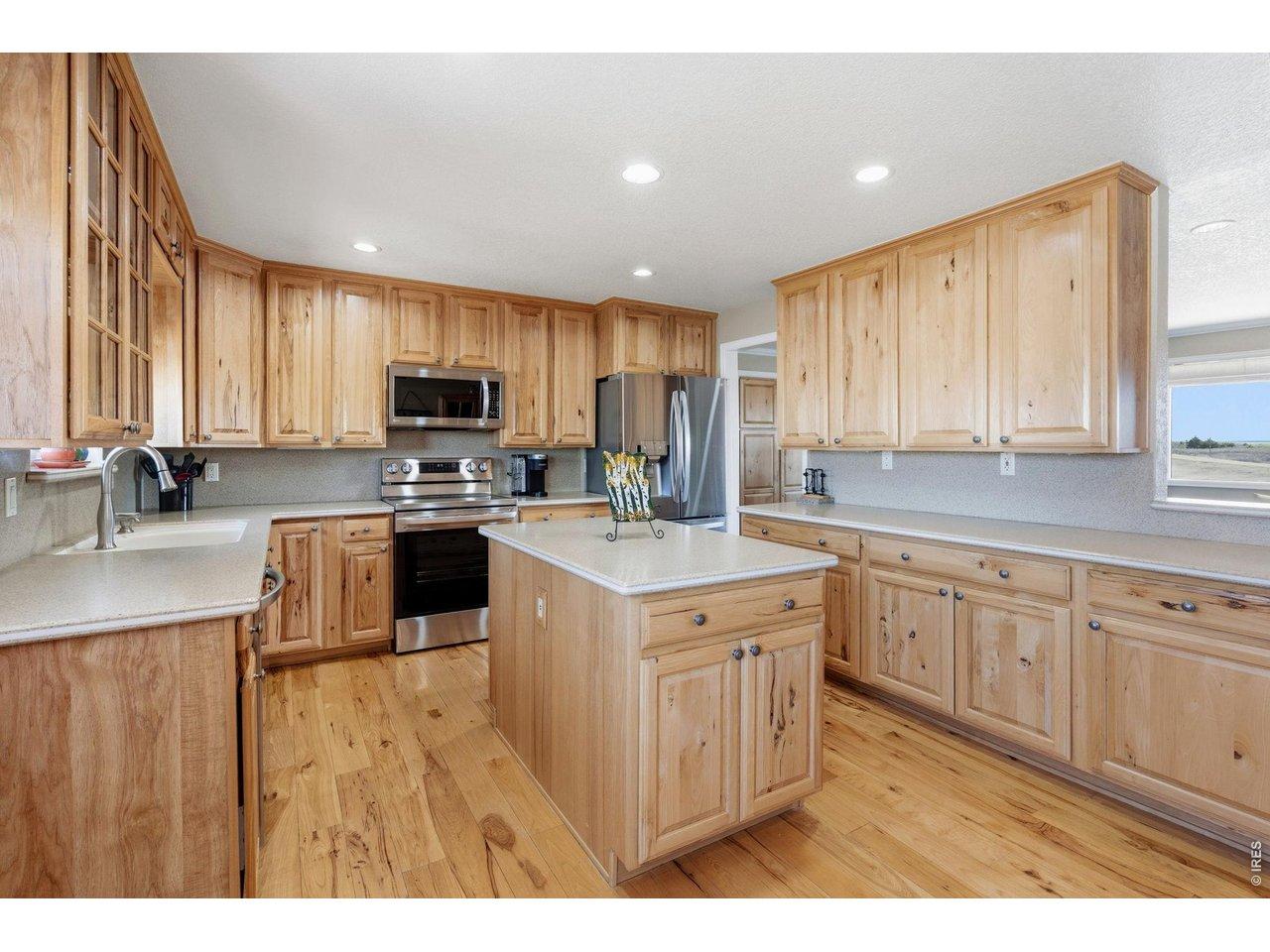 Image 3: Kitchen with Hickory cabinets and floors Image 3: Kitchen with Hickory cabinets and floors