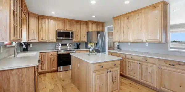 Image 3: Kitchen with Hickory cabinets and floors Image 3: Kitchen with Hickory cabinets and floors