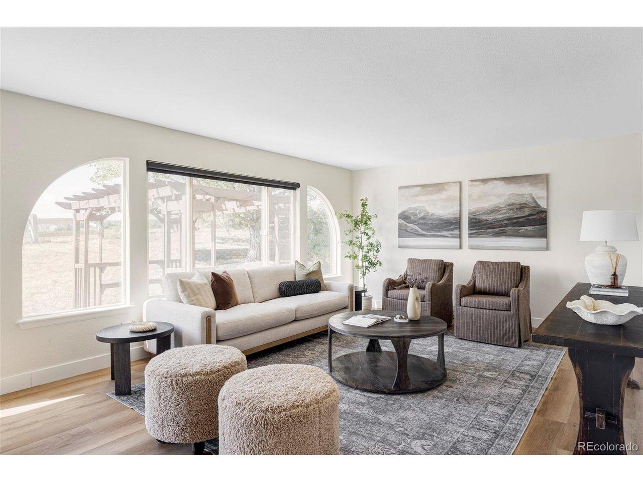 Image 3: Family room off of the large kitchen. Stunning views of the open space. Image 3: Family room off of the large kitchen. Stunning views of the open space.
