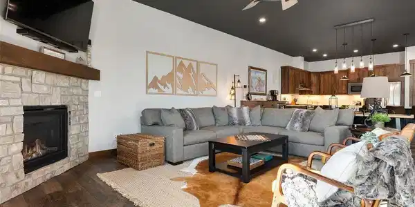 Image 4: Open-concept living space designed for entertaining family and friends.