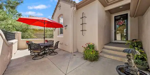 Image 2: Outdoor living shines year-round with a front courtyard, a deck, and a lower patio with a new hot tub, plus refreshed landscaping. Image 2: Outdoor living shines year-round with a front courtyard, a deck, and a lower patio with a new hot tub, plus refreshed landscaping.