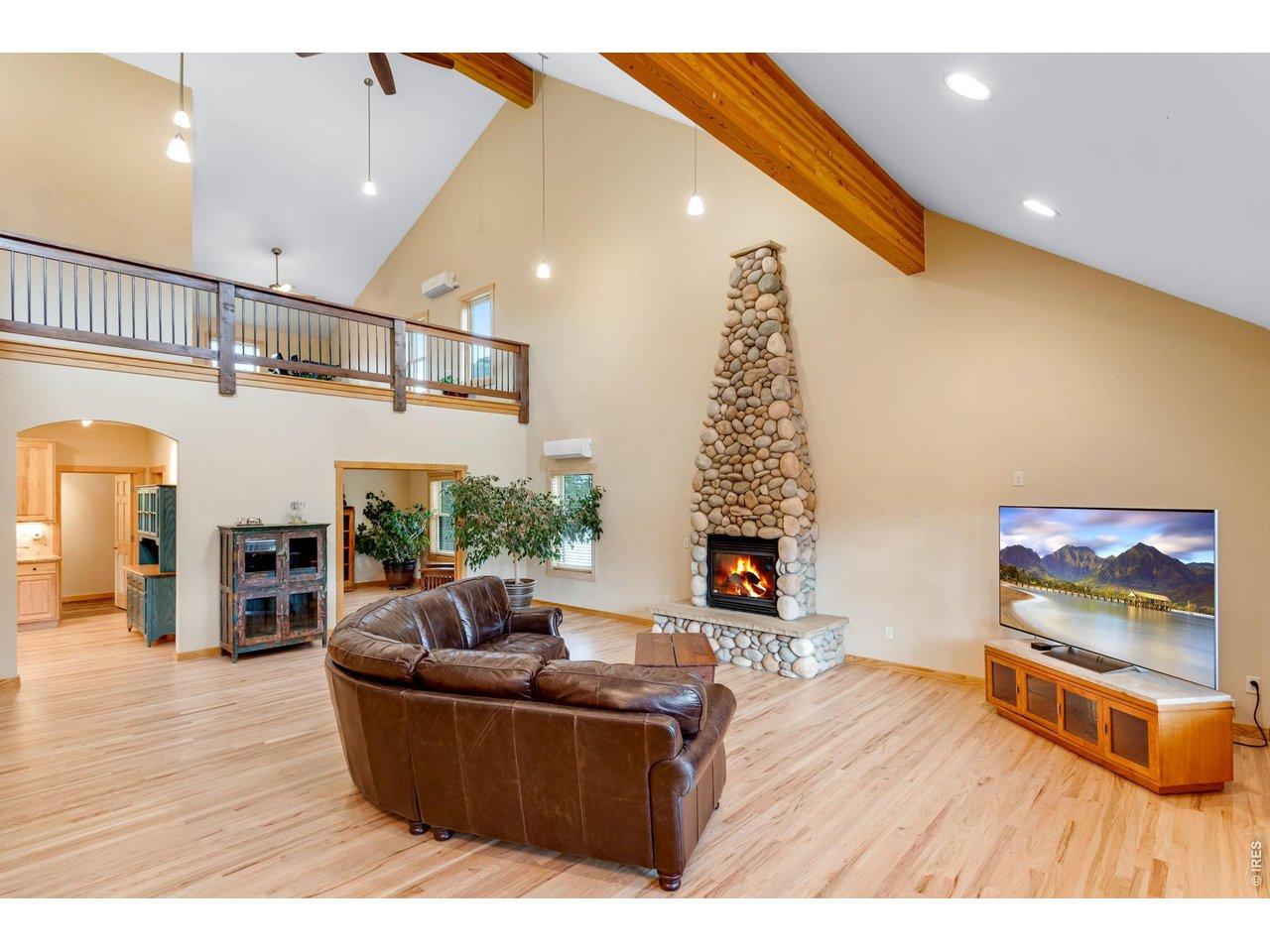 Image 3: Soaring vaulted ceilings with a gigantic loft in the great room. Image 3: Soaring vaulted ceilings with a gigantic loft in the great room.