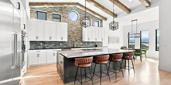 Image 4: Soaring, beamed ceilings stand above this gourmet kitchen with a full suite of Thermador appliances. Image 4: Soaring, beamed ceilings stand above this gourmet kitchen with a full suite of Thermador appliances.