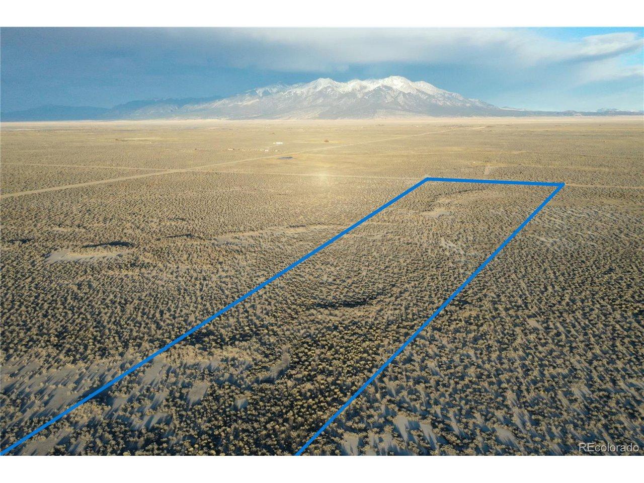 Image 1: Big view, picture taken along the SW boundary. Entrance onto the property runs along CR 116 South. You will need to forge a driveway.