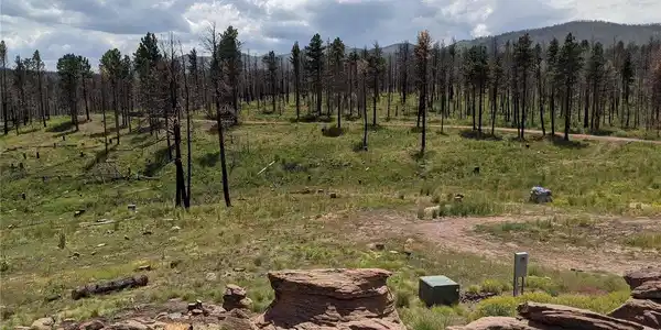 Image 4: View from the rock outcropping. One of two electrical boxes and electric pedestal. Image 4: View from the rock outcropping. One of two electrical boxes and electric pedestal.