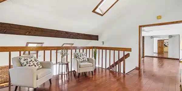 Image 4: Upstairs is loft, primary bed and bath with balcony Image 4: Upstairs is loft, primary bed and bath with balcony