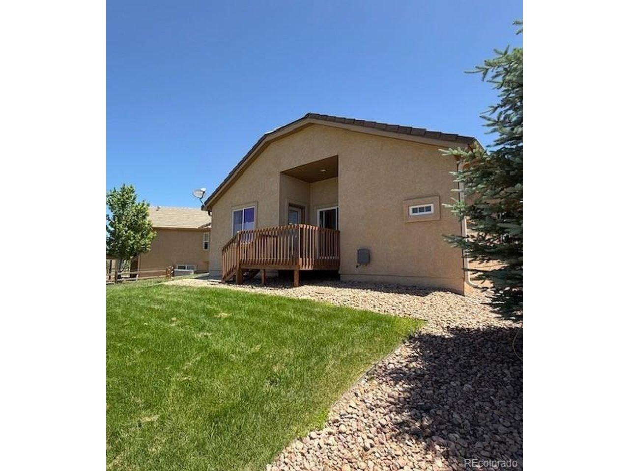 Image 3: back of home