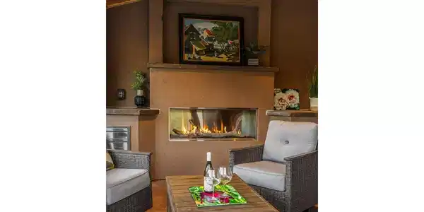 Image 4: A contemporary outdoor fireplace transforms the covered patio into a comfortable retreat in any season. Image 4: A contemporary outdoor fireplace transforms the covered patio into a comfortable retreat in any season.