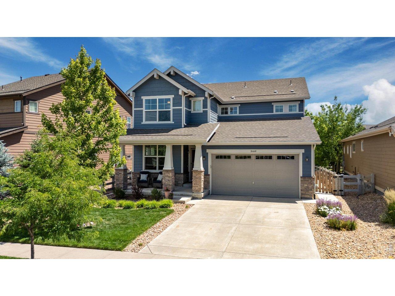 Image 2: An inviting covered porch welcomes you home!