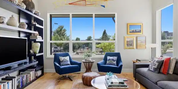 Image 2: The open-concept main level connects the living room, dining area, and kitchen while maintaining comfortable, defined gathering spaces. Image 2: The open-concept main level connects the living room, dining area, and kitchen while maintaining comfortable, defined gathering spaces.