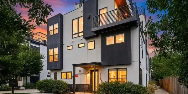 Image 2: Ideally located just five blocks from Sloan's Lake and minutes from Empower Field and downtown Denver. Thoughtfully designed with stylish finishes, flexible living spaces, and an expansive private rooftop deck, the home offers panoramic mountain and city v