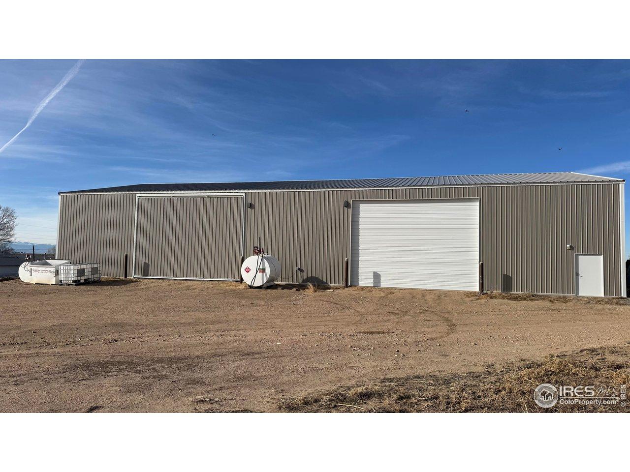Image 2: 57x110 steel machine shed with concrete floor. 480v 3 phase power to property. 220 power to shed with ability to increase. Image 2: 57x110 steel machine shed with concrete floor. 480v 3 phase power to property. 220 power to shed with ability to increase.