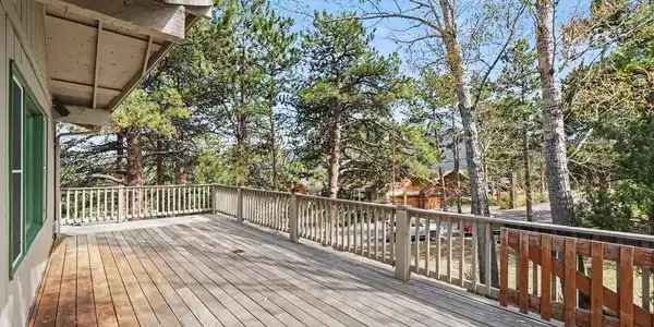 Image 4: This is a main feature of the house - the southern facing portion of the wraparound deck.