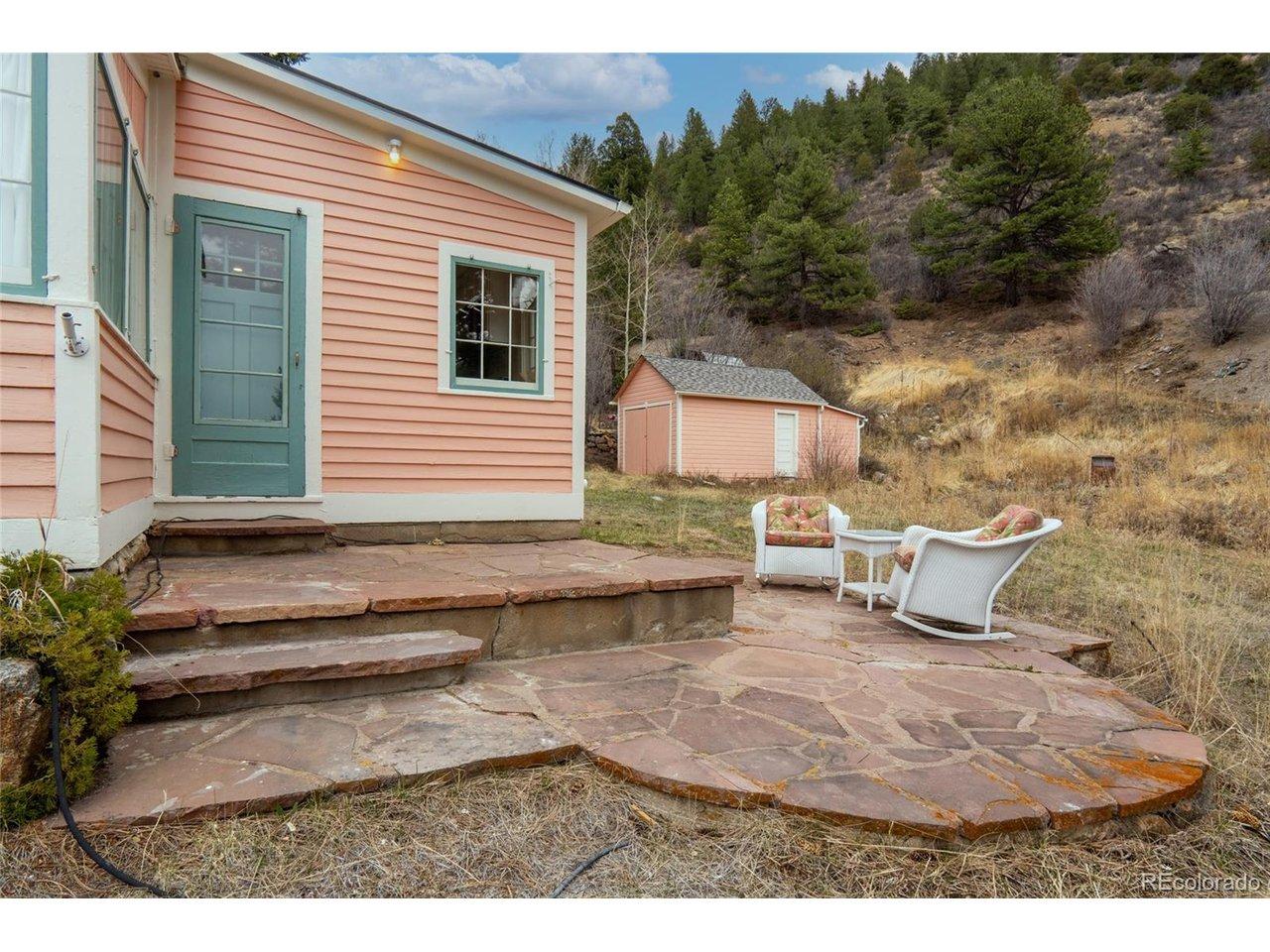 Image 4: entry to kitchen / BBQ access to expansive yard