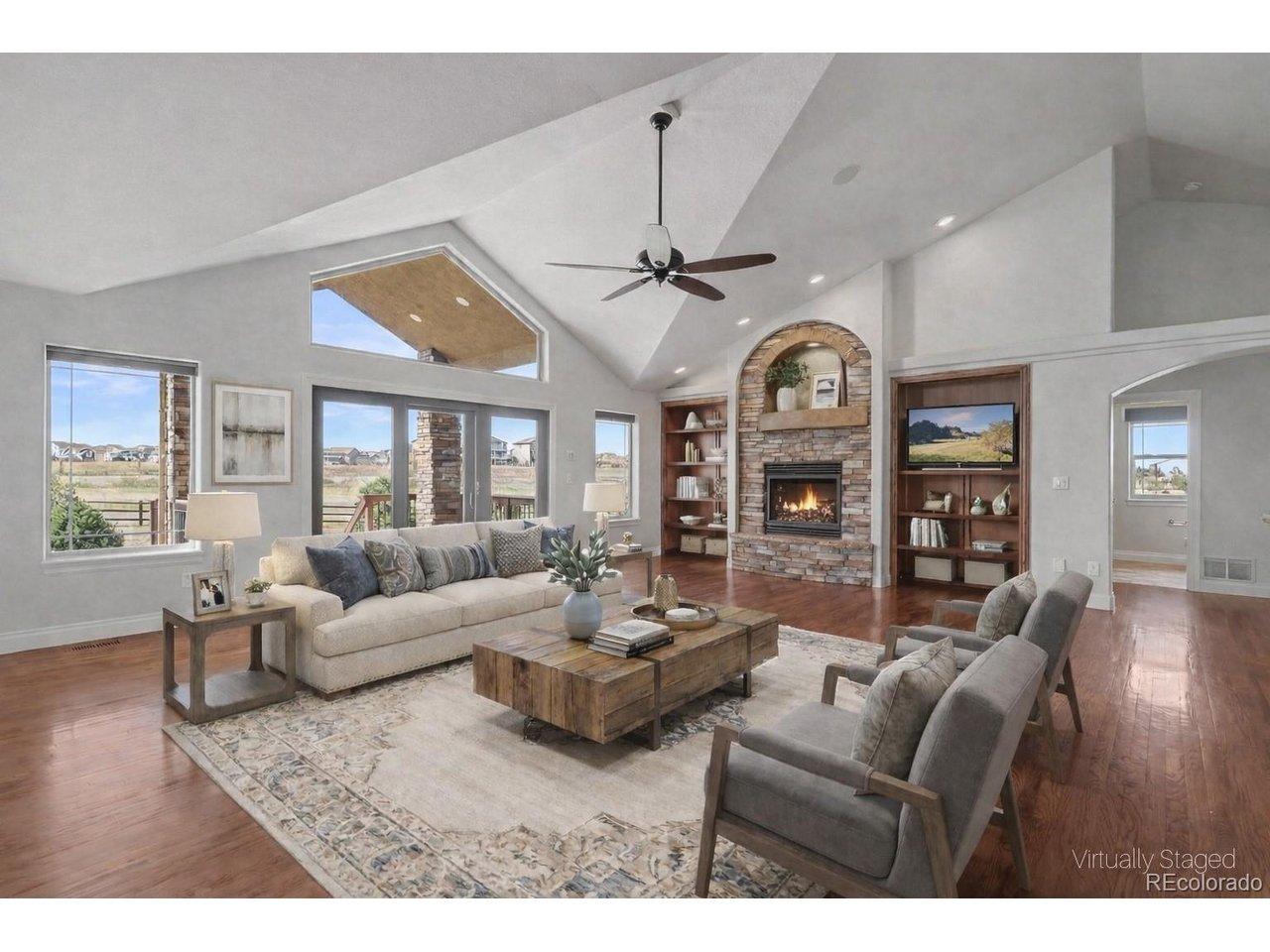 Image 2: Virtually Staged - Stunning Great Room, Vaulted Ceilings, Solid Wood Floors, Windows of Natural Light, Gas Fireplaces, Built-In Bookshelves Image 2: Virtually Staged - Stunning Great Room, Vaulted Ceilings, Solid Wood Floors, Windows of Natural Light, Gas Fireplaces, Built-In Bookshelves