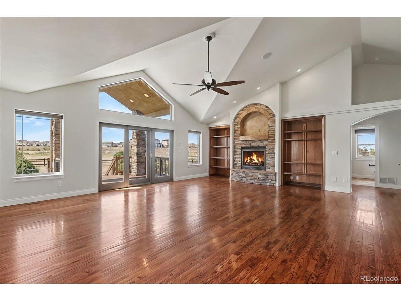 Image 3: Stunning Great Room, Vaulted Ceilings, Solid Wood Floors, Windows of Natural Light, Gas Fireplaces, Built-In Bookshelves Image 3: Stunning Great Room, Vaulted Ceilings, Solid Wood Floors, Windows of Natural Light, Gas Fireplaces, Built-In Bookshelves