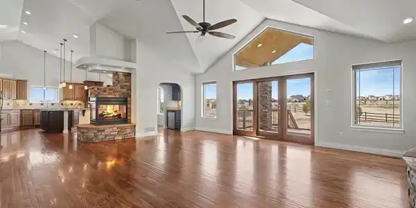Image 4: Stunning Great Room, Vaulted Ceilings, Solid Wood Floors, Windows of Natural Light, Gas Fireplaces, Built-In Bookshelves Image 4: Stunning Great Room, Vaulted Ceilings, Solid Wood Floors, Windows of Natural Light, Gas Fireplaces, Built-In Bookshelves