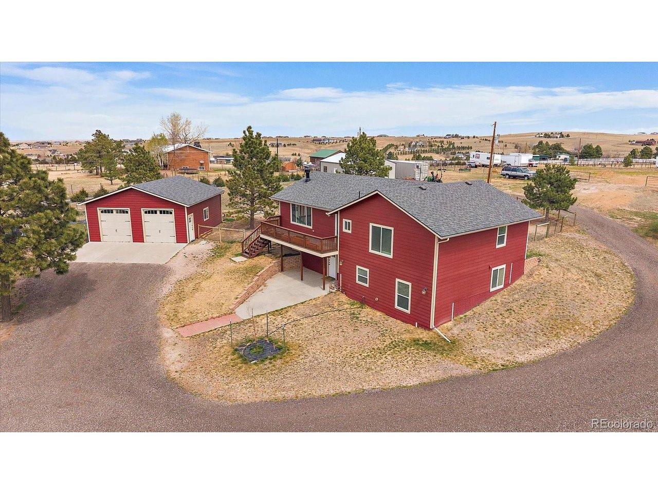 Image 2: Main house with 2 car detached garage