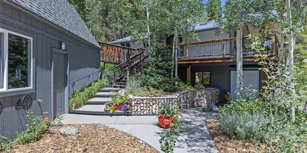 Image 4: Landscaped walkway to front door or lower level suite entry