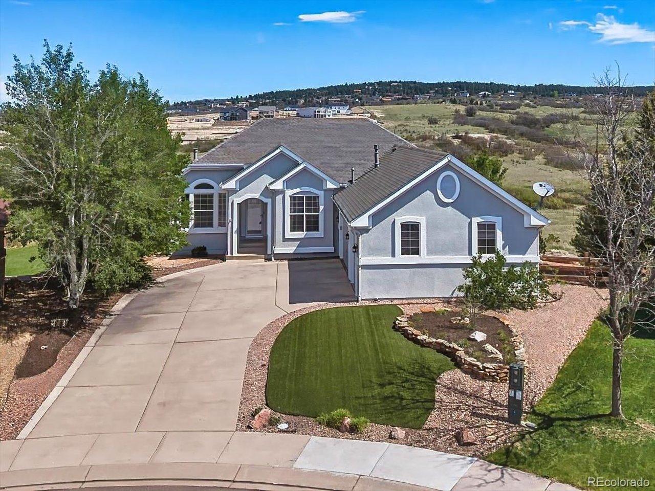 Image 1: Attractive stucco exterior with mature landscaping, a spacious driveway, and an attached 3-car garage situated on a quiet cul-de-sac lot. Image 1: Attractive stucco exterior with mature landscaping, a spacious driveway, and an attached 3-car garage situated on a quiet cul-de-sac lot.