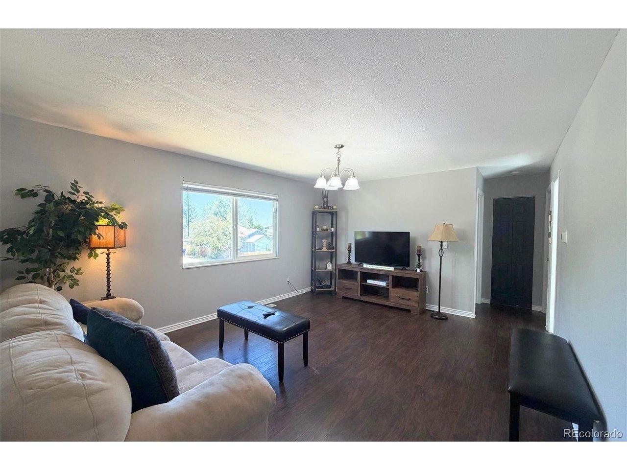 Image 4: Bright and inviting living room, perfect for everyday living and entertaining Image 4: Bright and inviting living room, perfect for everyday living and entertaining