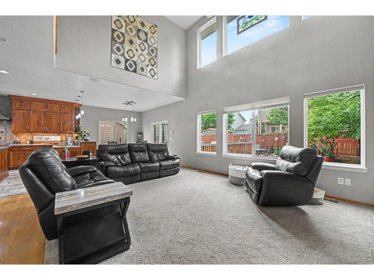 Image 4: Lots of natural light flooding the living room. Image 4: Lots of natural light flooding the living room.