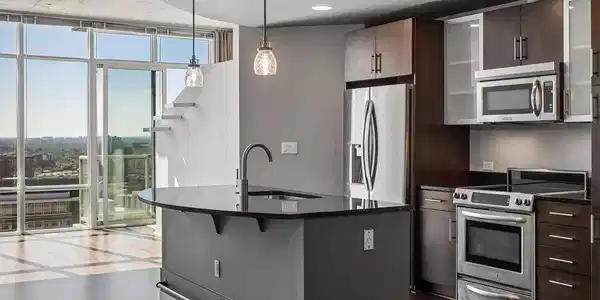 Image 2: Overlooking kitchen, stainless appliances and island for seating. Image 2: Overlooking kitchen, stainless appliances and island for seating.
