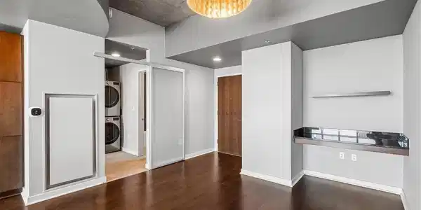 Image 4: Front entrance; laundry in-unit; built-in desk space. Image 4: Front entrance; laundry in-unit; built-in desk space.