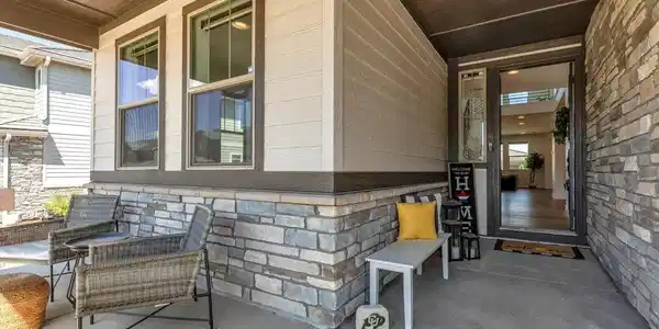 Image 3: Cozy covered front porch and entry