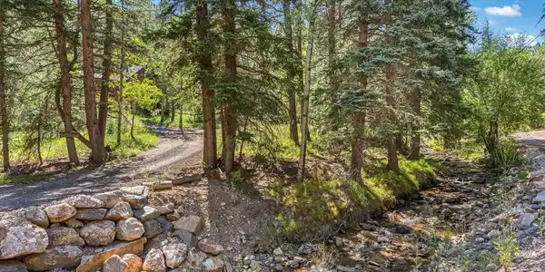 Image 2: Lower property boundary is Miller Fork Stream, glorious to listen to and play in year round