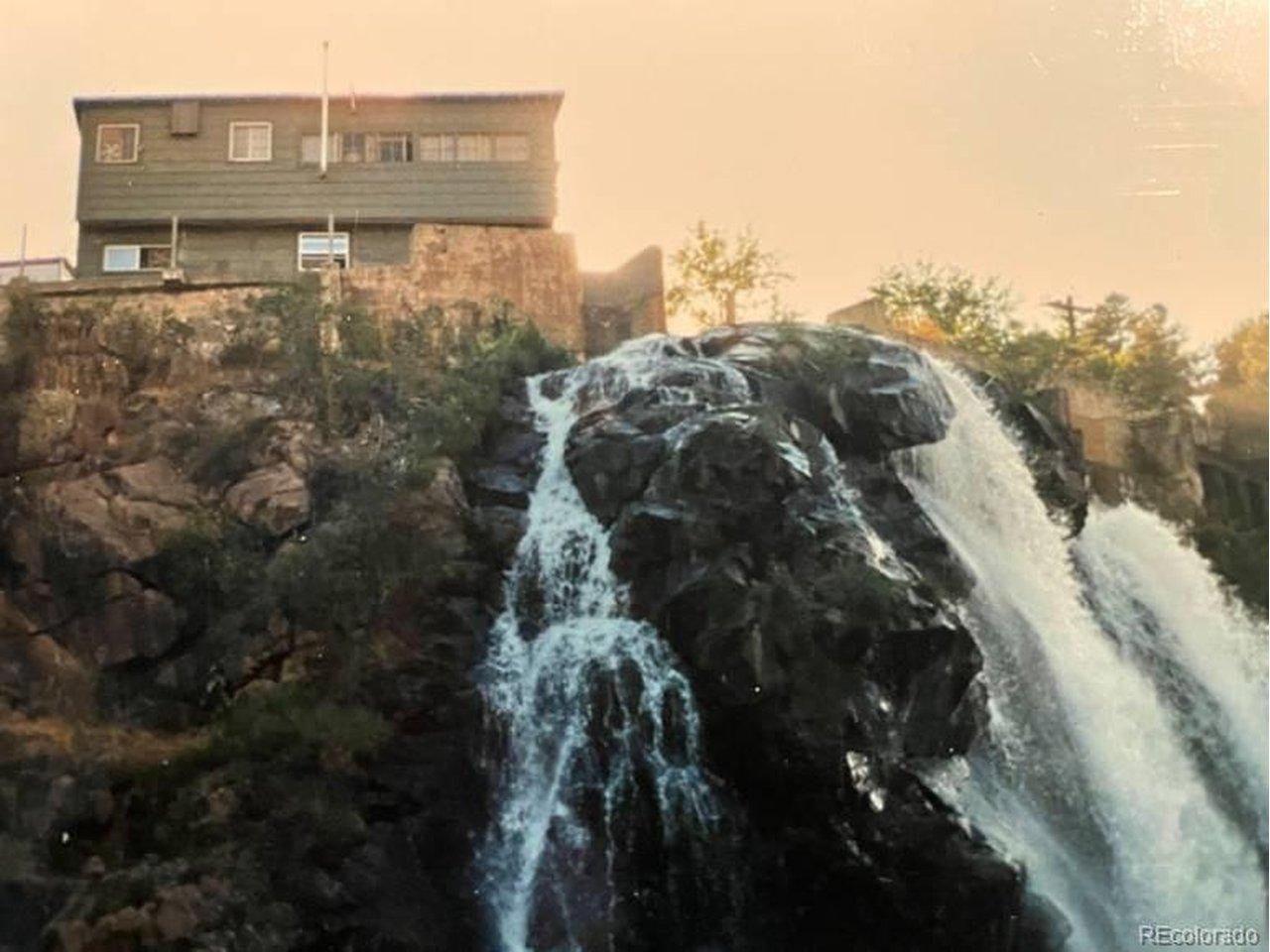 Image 1: Rim Rock House - Waterfall taken with drone Image 1: Rim Rock House - Waterfall taken with drone