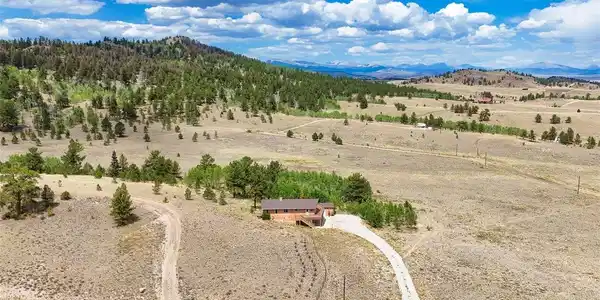 Image 2: Home and Mountains