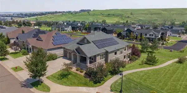Image 2: Owned solar panels keep utility costs consistently low.