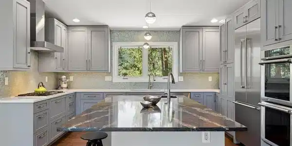 Image 3: The custom kitchen is equipped with built-in Thermador appliances and anchored by a limited-release Princetown quartz island by Cambria Image 3: The custom kitchen is equipped with built-in Thermador appliances and anchored by a limited-release Princetown quartz island by Cambria