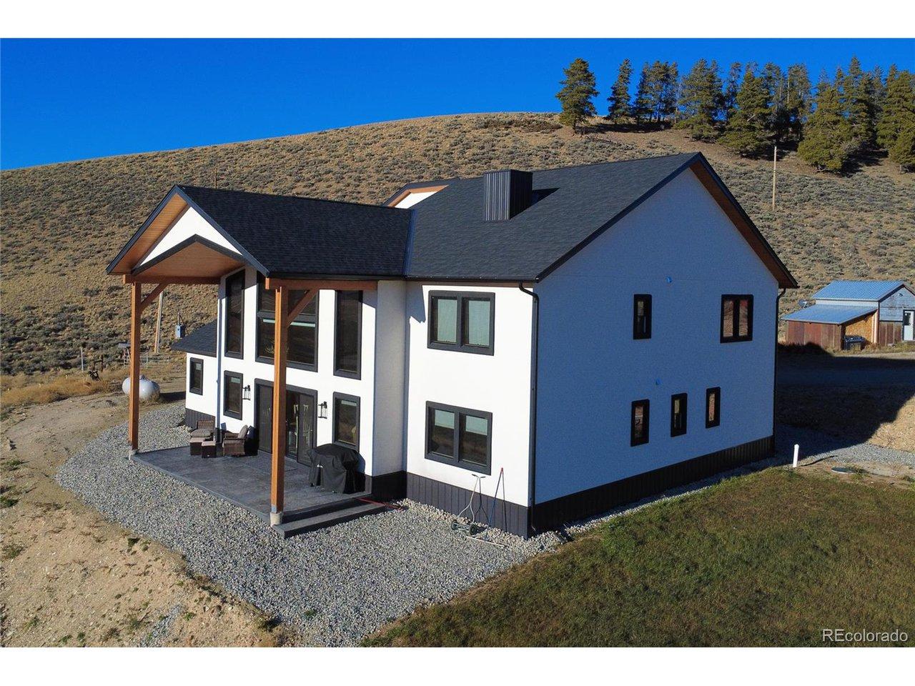 Image 3: back porch with expansive windows