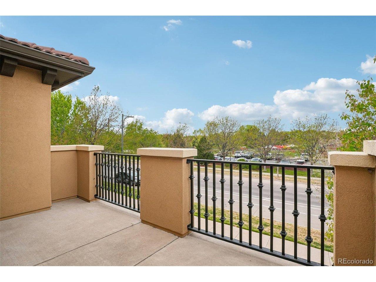 Image 4: West facing balcony off of the great room with mountain views Image 4: West facing balcony off of the great room with mountain views