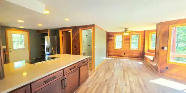 Image 2: Massive open floor plan for the dining room, updated kitchen, and sun room. Image 2: Massive open floor plan for the dining room, updated kitchen, and sun room.