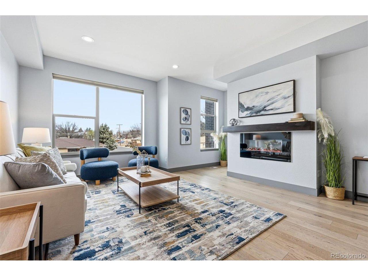 Image 2: Cozy up to the beautiful fireplace