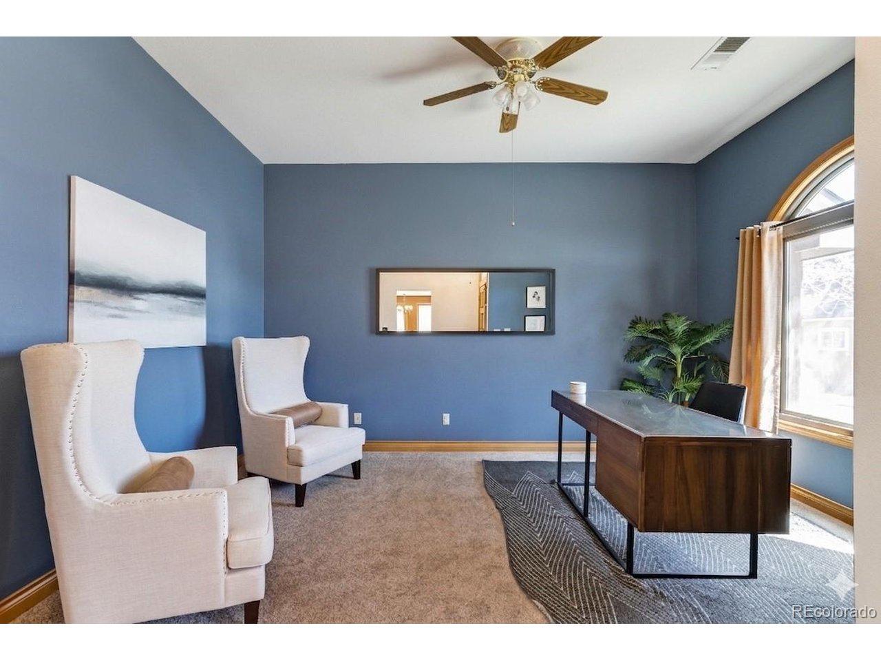 Image 2: Front living room or flex space with natural light Image 2: Front living room or flex space with natural light