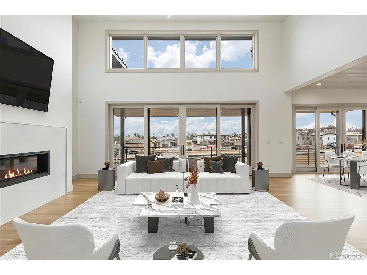 Image 4: Transom windows elevate the space, inviting abundant natural light while enhancing architectural interest and privacy. Image 4: Transom windows elevate the space, inviting abundant natural light while enhancing architectural interest and privacy.