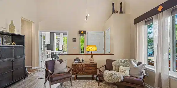 Image 4: Inviting formal living area filled with natural light