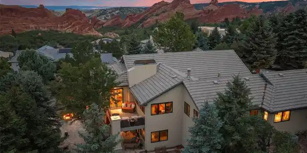 Image 4: Endless sky, red rocks and a home glowing at the center of it all - this is the view that never gets old. Image 4: Endless sky, red rocks and a home glowing at the center of it all - this is the view that never gets old.