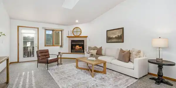 Image 3: Living Room with gas fireplace and vaulted ceiling Image 3: Living Room with gas fireplace and vaulted ceiling