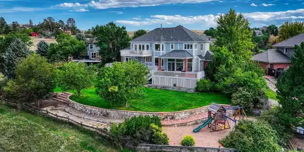 Image 3: Backyard view - decks, large yard, playground and regulation size horseshoe pit Image 3: Backyard view - decks, large yard, playground and regulation size horseshoe pit