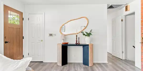 Image 2: A welcoming front entry with clean lines, warm wood tones and an easy flow into the rest of the home. Image 2: A welcoming front entry with clean lines, warm wood tones and an easy flow into the rest of the home.