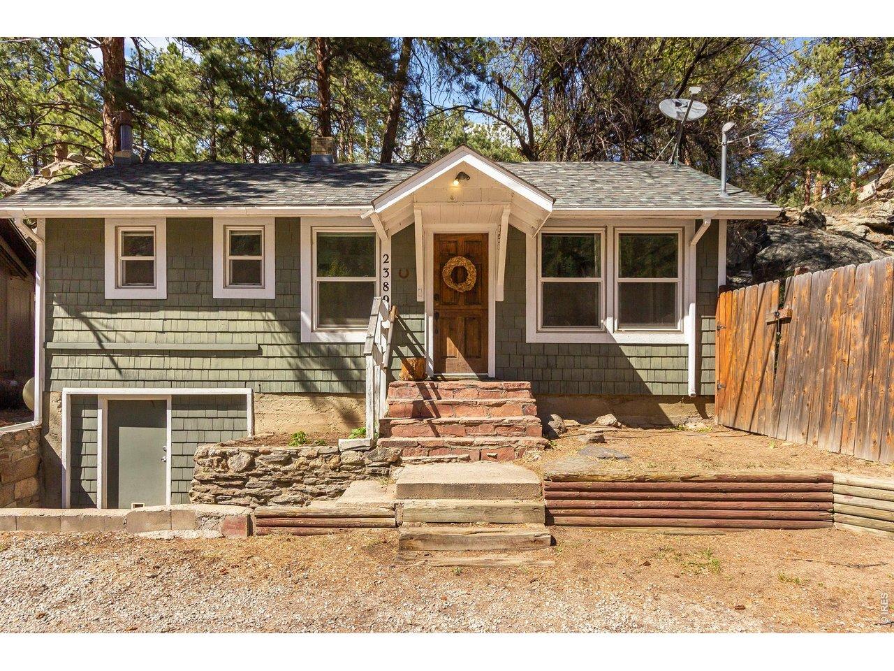 Image 1: Welcome home to this charming mountain cottage, featuring a welcoming front porch with stone steps, and a private fenced yard. Image 1: Welcome home to this charming mountain cottage, featuring a welcoming front porch with stone steps, and a private fenced yard.