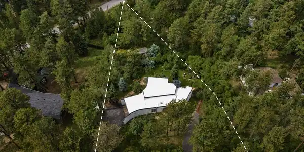 Image 4: Experience the privacy and serenity of this tree-filled homesite. Approximate property boundaries are shown for reference. Image 4: Experience the privacy and serenity of this tree-filled homesite. Approximate property boundaries are shown for reference.