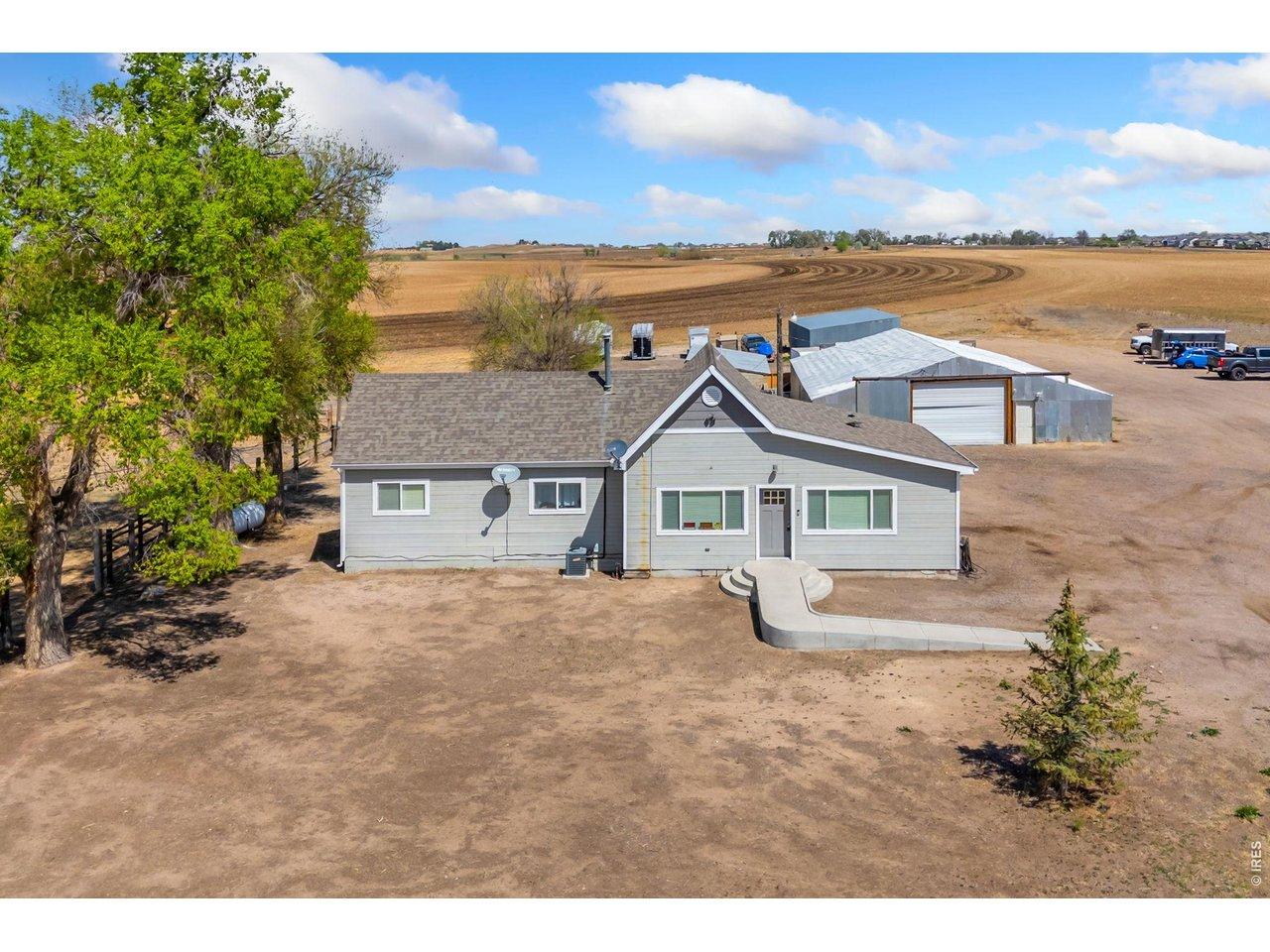 Image 4: Located just minutes from Downtown Windsor, this fully updated farmhouse on 3.94 acres offers a rare combination of functionality, location, and endless potential. The 1,258 sq. ft. home features 3 bedrooms and 2 bathrooms and has been thoughtfully updated